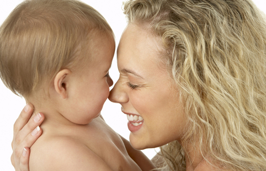 Mother And Child Smiling