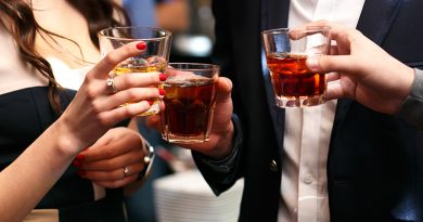 people-toasting-whiskey-glasses-hero