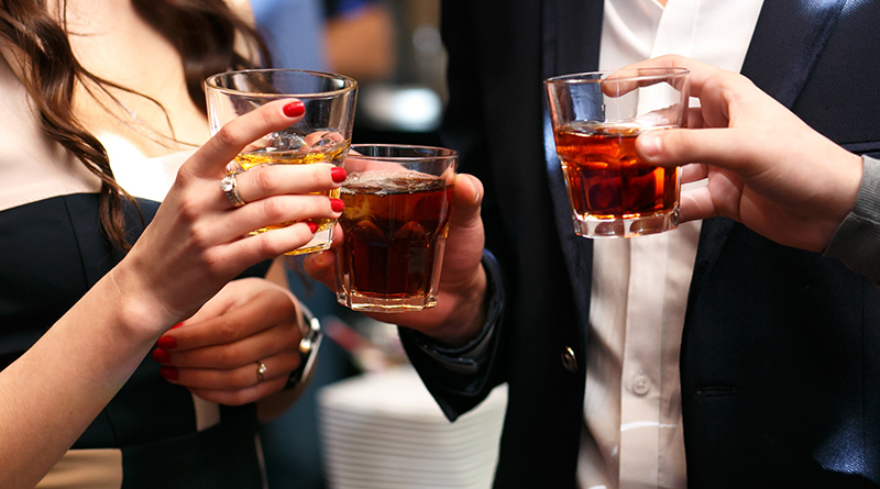 people-toasting-whiskey-glasses-hero